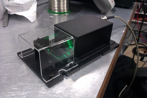 Wide-Beam Eye-Safe Laser Module for Laser Labyrinth Applications